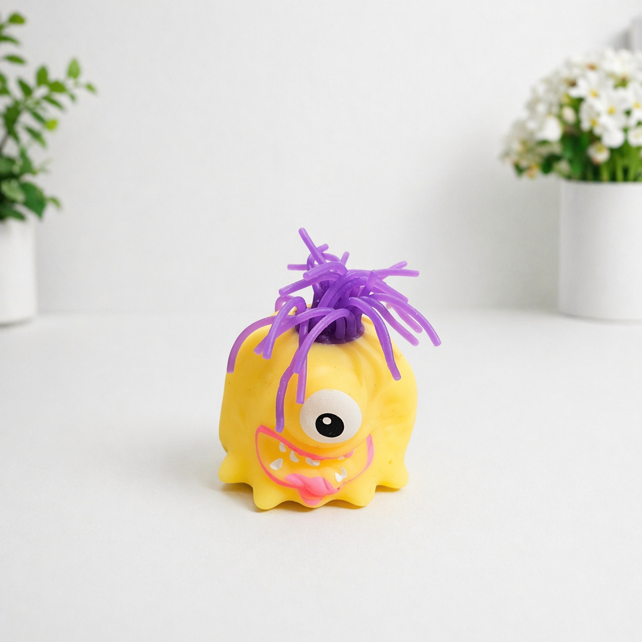 Noodle Hair Monster Squishy Toy 👾